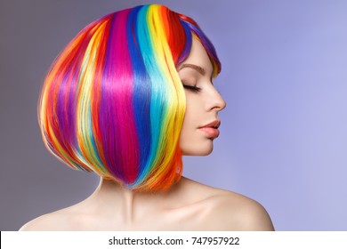 Woman Hair As Color Splash. Rainbow Up Do Short Haircut. Beautiful Young Girl Model With Glowing  Healthy Skin.