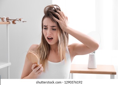 Woman With Hair Loss Problem At Home