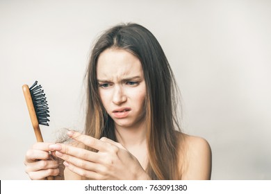 Woman With Hair Problems,lost Hair On Comb