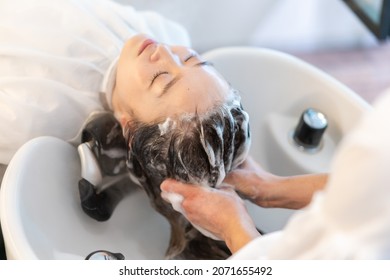 A Woman At A Hair Salon