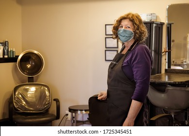 Woman Hair Salon Owner Waiting For Customers Wearing Protective Mask; Missouri, Midwest