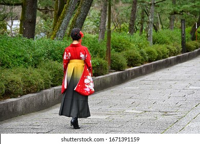 
A Woman In A Hakama Heading For The Ceremony