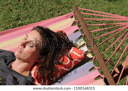 Similar – After this Photocase shock, I have to take a nap in the hammock.