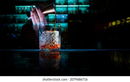 Woman Hand Bartender Making Cocktail In Bar Counter