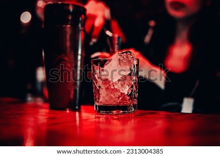 woman hand bartender making cocktail on the bar counter