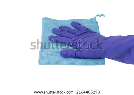 Woman hand in blue latex glove with micro fiber folded rag for cleaning, isolated on white background.