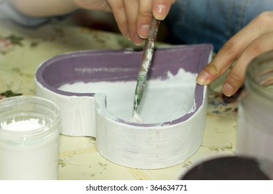 Woman Hand With A Brush And Glue For A Decoupage