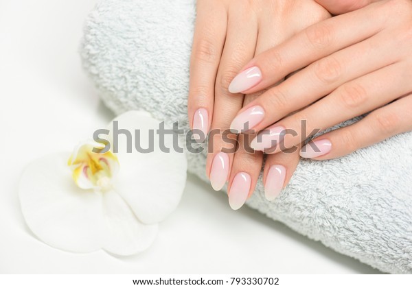 Woman hand care. Hands and spa relaxing. Beauty\
woman nails.