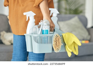 Woman, hand or cleaning bucket of housekeeping product, hotel maintenance or home healthcare wellness. Zoom, cleaner or maid worker with container, spray bottle or scrub brush for hospitality service - Powered by Shutterstock