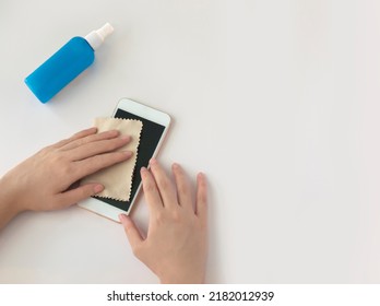 Woman Hand Cleaning Phone Screen , Cleaning The Phone Screen With A Fiber Cloth