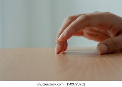 Woman Hand Finger Tapping On Table.