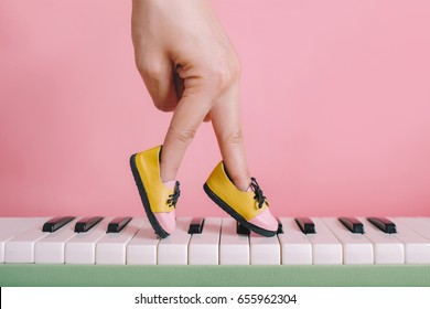 Woman Hand Finger Walking On Piano With Shoe Concept, Music Lesson School Education Concept, Dance Exercise For Good Healthy.