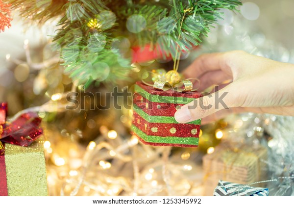 Woman Hand Hanging Box Decoration On Stock Photo Edit Now 1253345992