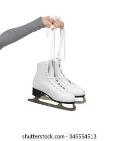 Woman Hand Hold Ice Skates Isolated On A White Background