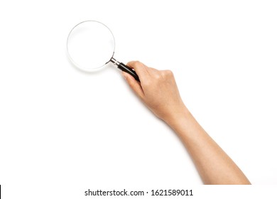Woman hand hold a magnifier isolated on white.