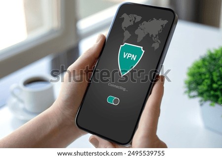 woman hand hold phone with app vpn creation Internet protocols for protection private network over table in cafe
