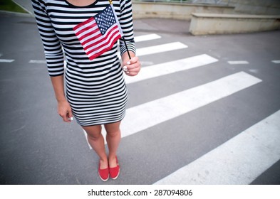 Woman Hand Holding American Flag.