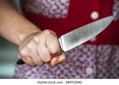 Woman Hand Holding Big Knife. Aggressive Woman.