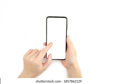 Woman Hand Holding The Black Smartphone With Blank Screen Isolated On White Background. Top View.