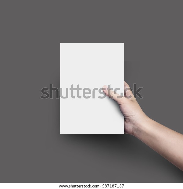 Stockfoto 587187137 Med Woman Hand Holding Blank Paper Sheet