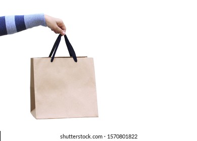 Woman Hand Holding Blank Shopping Bag On White Background