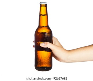 Woman hand holding bottle of beer