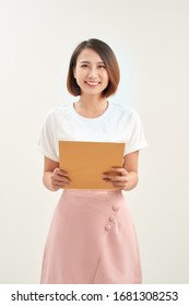 Woman Hand Holding Brown Envelope On White Background