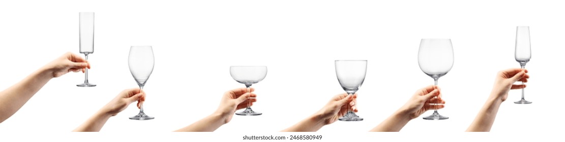 Woman hand holding empty cocktail glass isolated on white background. - Powered by Shutterstock