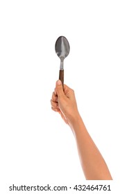 Woman Hand Holding An Empty Spoon, Composition Isolated Over On The White Background With Clipping Path