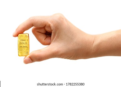 Woman Hand Holding A Gold Bar To Take A Close Up Photo