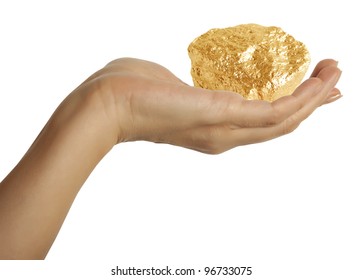 A Woman Hand Holding A Gold Nugget