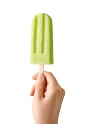Woman Hand Holding Green Fruit Popsicle Isolated On White Background. Apple, Lime And Pear Flavor