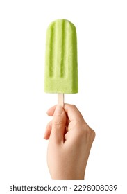 Woman hand holding green fruit popsicle isolated on white background. Apple, lime and pear flavor
