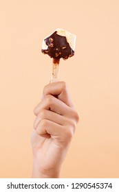 Woman Hand Holding Ice Cream Bar