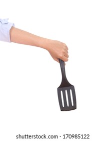 Woman Hand Holding A Kitchen Spatula Isolated On White Background