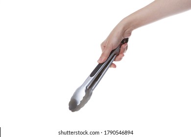 Woman Hand Holding Kitchen Tongs On Isolated White Background