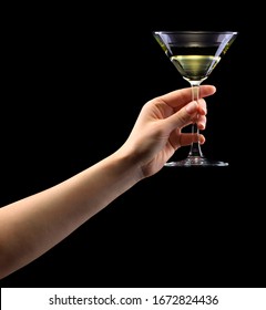 Woman Hand Holding Martini Glass Isolated On Black Background With Clipping Path