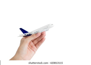 Woman Hand Holding Model Airplane, Isolated On White Background.