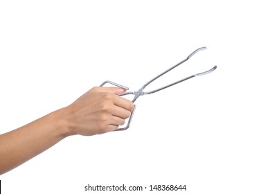 Woman Hand Holding An Opened Kitchen Tongs Isolated On A White Background