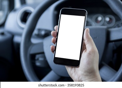 Woman Hand Holding Phone With A Blank Screen In Car