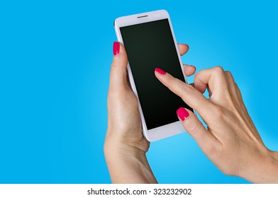 Woman Hand Holding The Phone On Blue Background