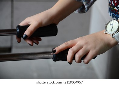 Woman Hand Holding Pinball Arms