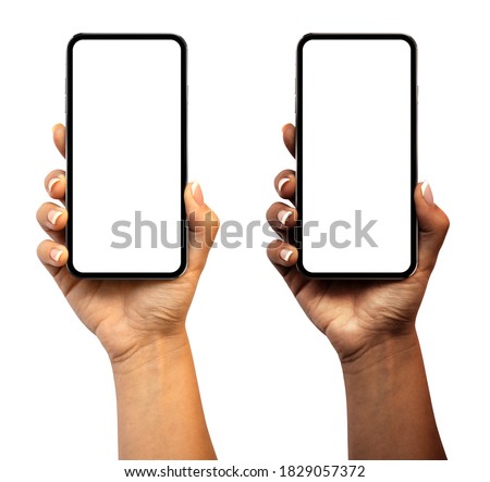 Woman hand holding the smartphone with blank screen and modern frameless design (black and white skinned version) - isolated on white background Imagine de stoc © 