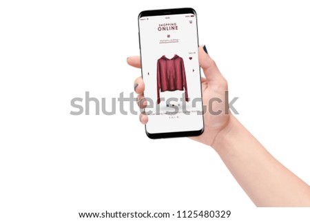 Woman hand holding smartphone and shopping online isolated on white background background. Online shopping concept