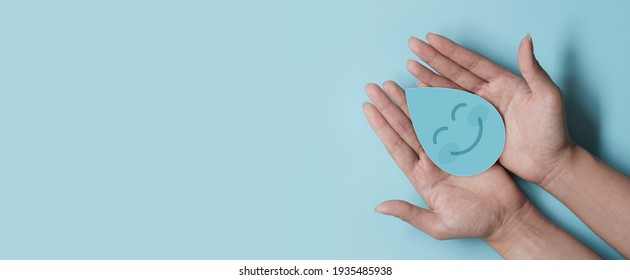 Woman Hand Holding Smile Water Drop Paper Cut, World Water Day, Clean Water And Sanitation, Hand Sanitizer And Hygiene, Washing Hands, CSR, Save Water, Clean Renewable Energy Concept