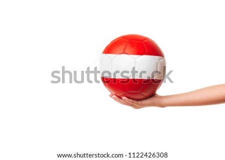 Woman hand holding soccer ball. isolated on white