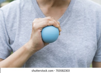 Woman Hand Holding A Stress Ball