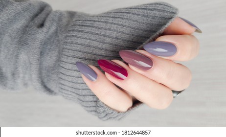 Woman long bottles nails