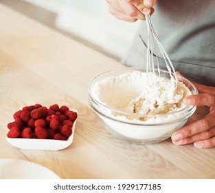 Woman Hand Mixed Batter on Clear Bowl with Baloon Whisk Step by Step Baking Preparation in the Kitchen - Powered by Shutterstock