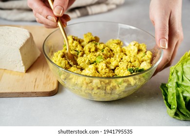 Woman Hand Mixing Delicious Vegan Egg Salad